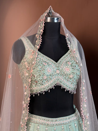Pistachio Green Heavy Embroidered Net Lehenga Set