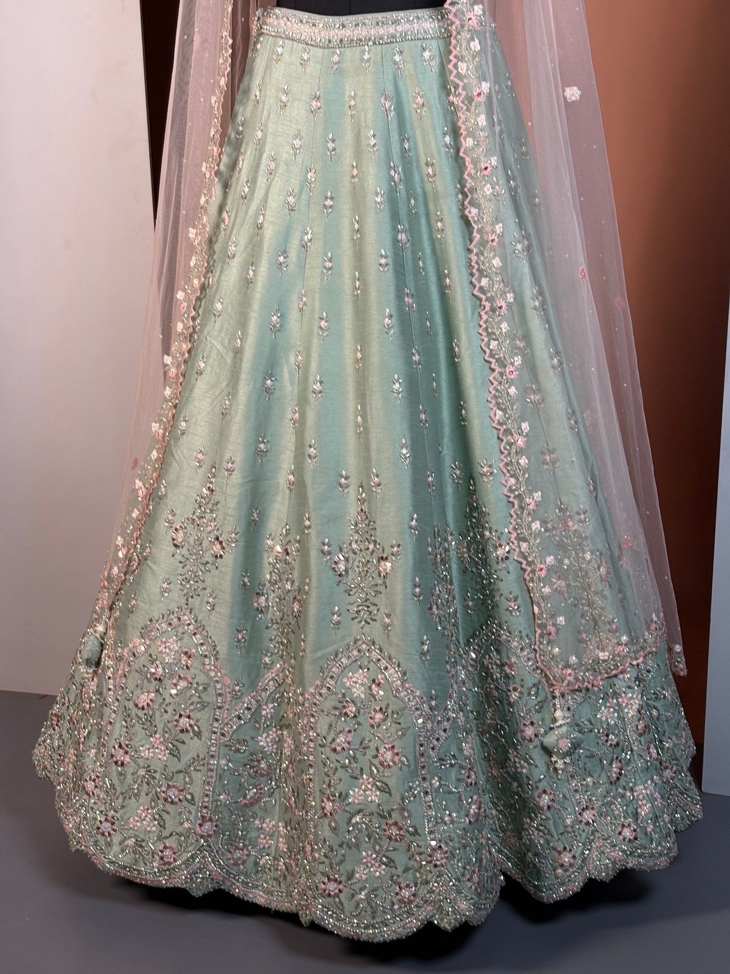 Pistachio Green Heavy Embroidered Net Lehenga Set