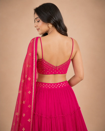 Rani Pink Mirror Work Lehenga Choli with Tiered Skirt & Net Dupatta