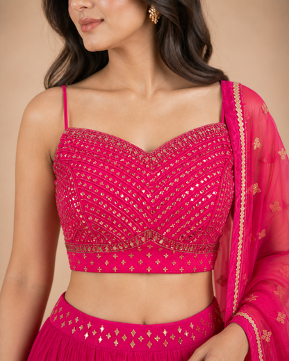 Rani Pink Mirror Work Lehenga Choli with Tiered Skirt & Net Dupatta