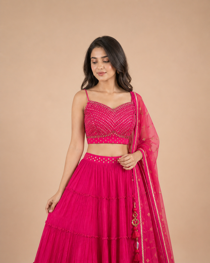 Rani Pink Mirror Work Lehenga Choli with Tiered Skirt & Net Dupatta