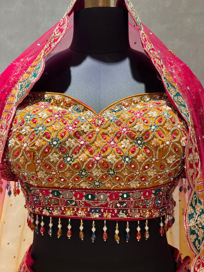 Rani Pink Multicolour Panelled Embroidered Lehenga with Mirrorwork Blouse & Dupatta