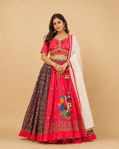 Rani Pink Navratri Lehenga Choli with Patola Print Panel Work & Mirror Embroidered Blouse
