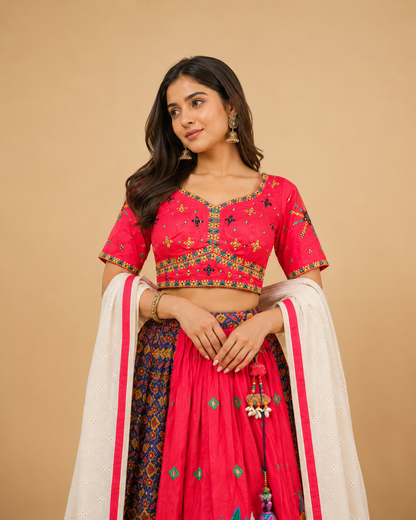 Rani Pink Navratri Lehenga Choli with Patola Print Panel Work & Mirror Embroidered Blouse