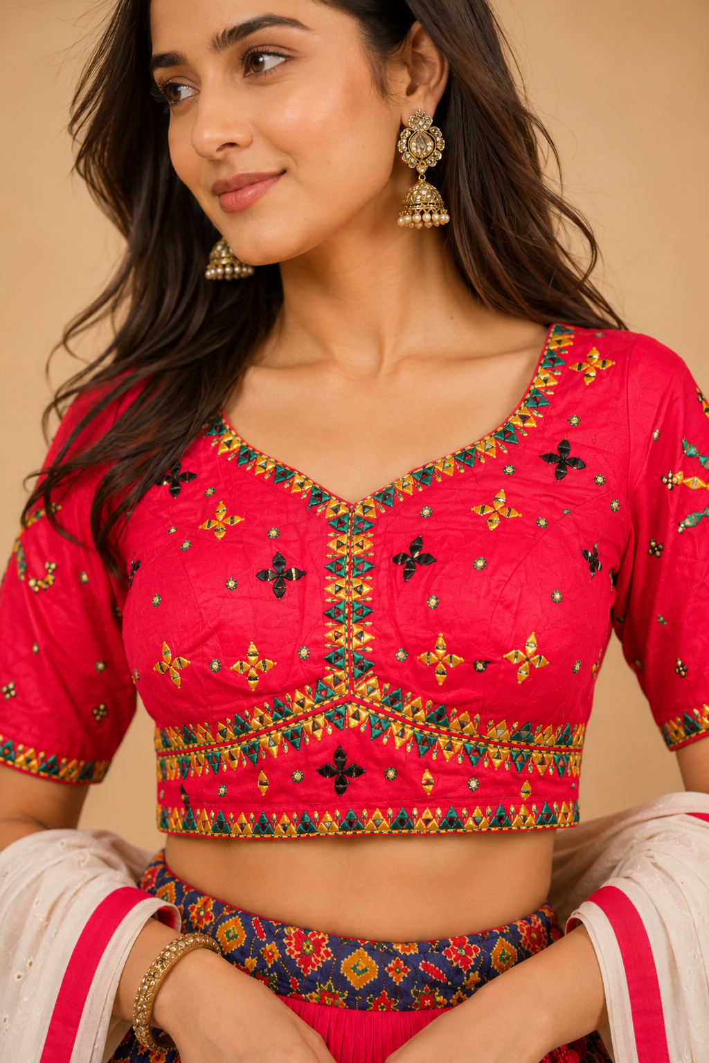 Rani Pink Navratri Lehenga Choli with Patola Print Panel Work & Mirror Embroidered Blouse