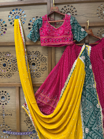 Rani Pink and Green Bandhej Navratri Chaniya Choli with Yellow Dupatta