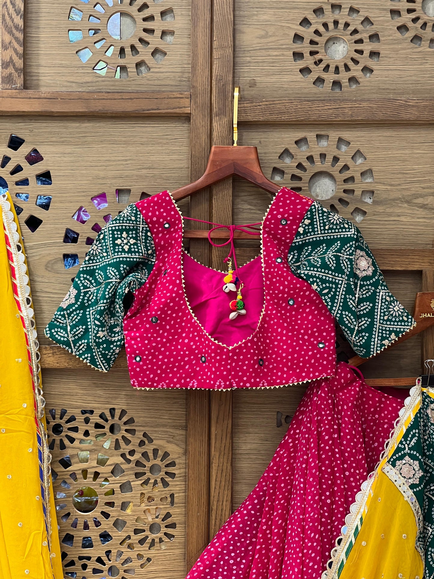 Rani Pink and Green Bandhej Navratri Chaniya Choli with Yellow Dupatta