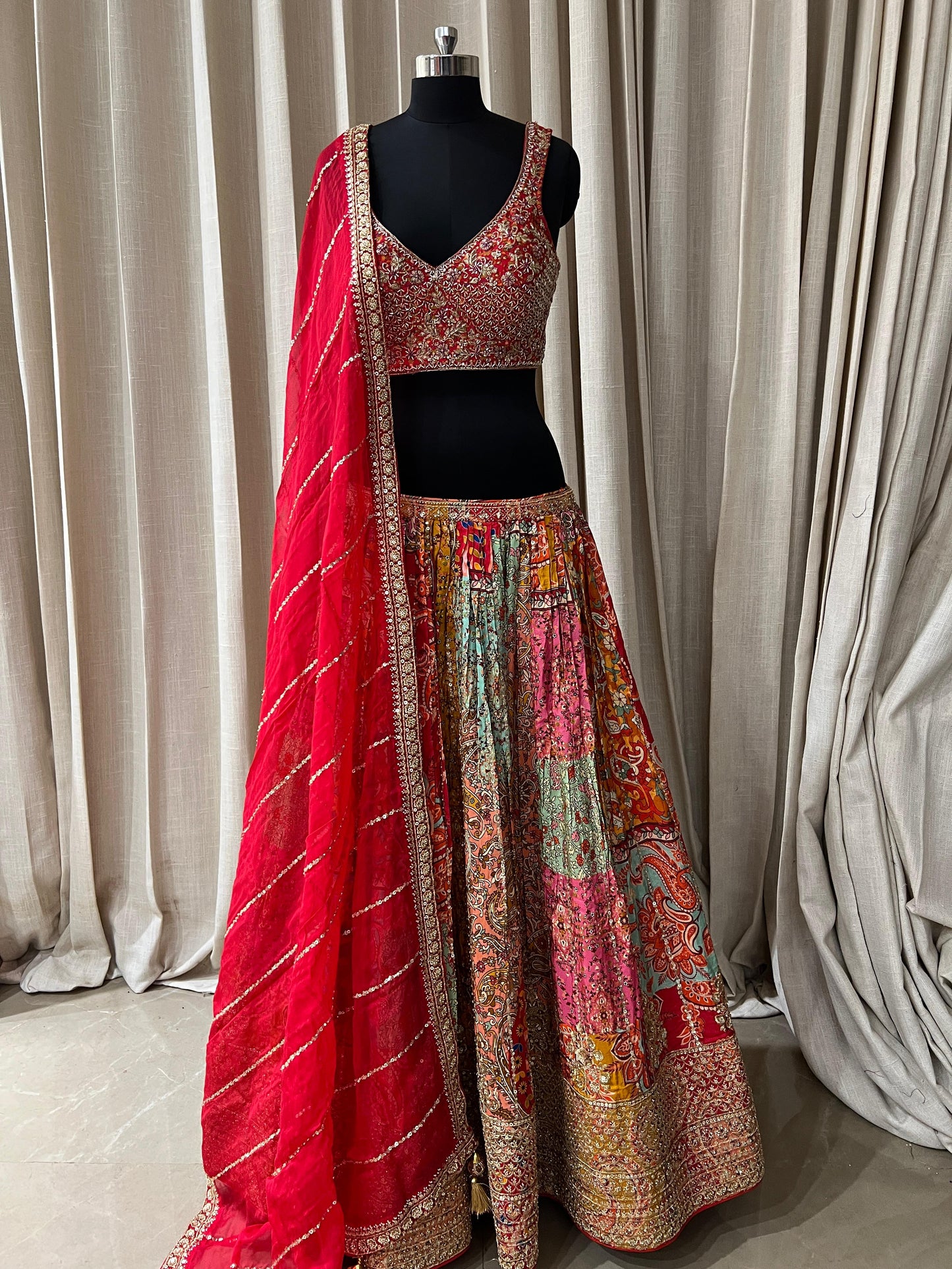 Red and Multicolor Patola Print Bridal Lehenga Choli with Embroidered Blouse