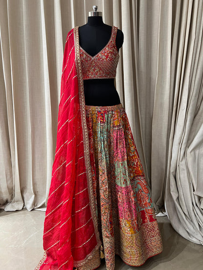 Red and Multicolor Patola Print Bridal Lehenga Choli with Embroidered Blouse