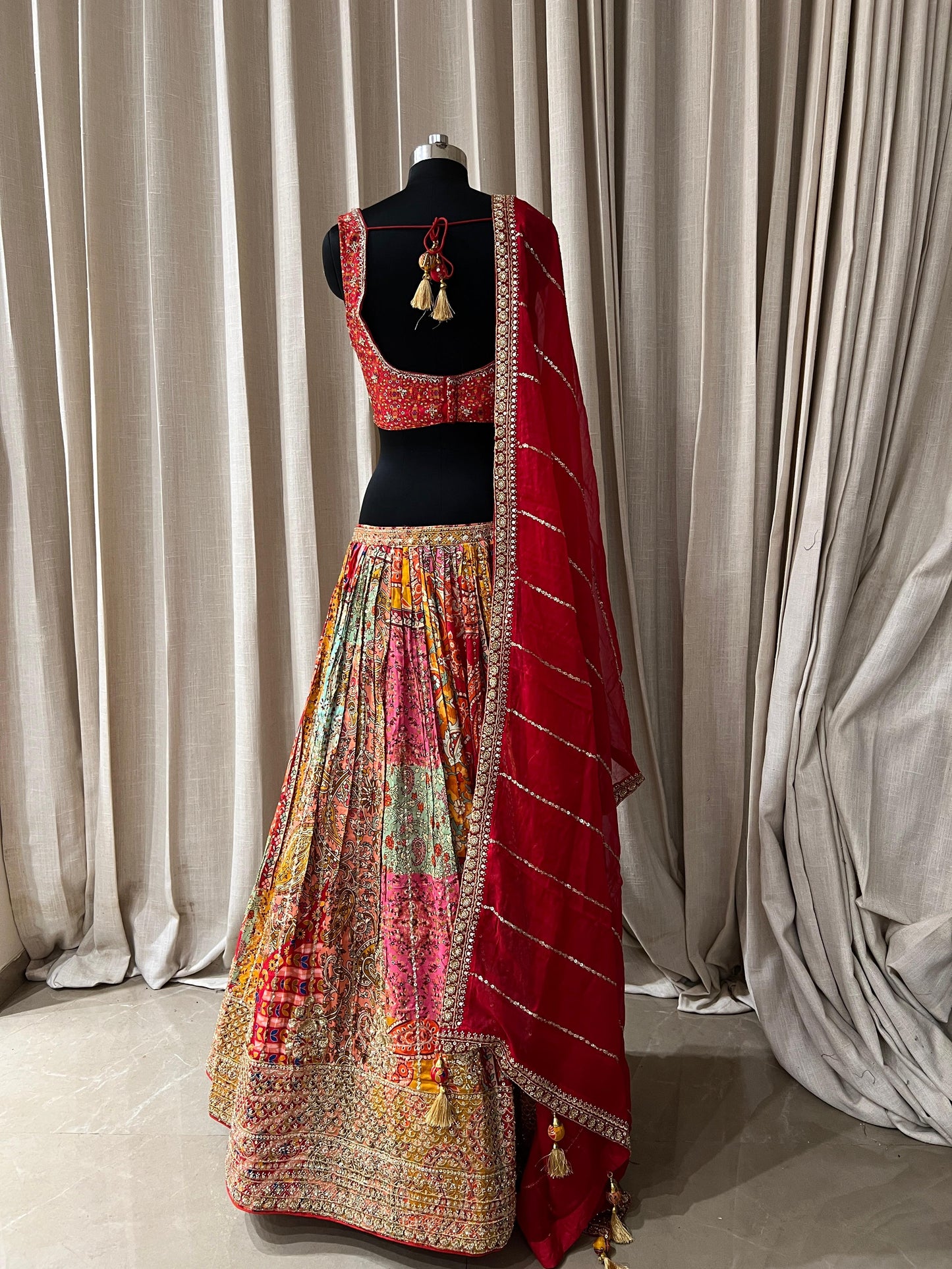 Red and Multicolor Patola Print Bridal Lehenga Choli with Embroidered Blouse