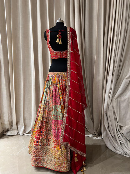 Red and Multicolor Patola Print Bridal Lehenga Choli with Embroidered Blouse