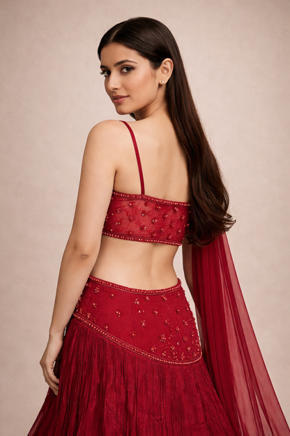 Ruby Red Hand Embroidered Designer Lehenga Choli with Cutwork Waist & Tassel Blouse