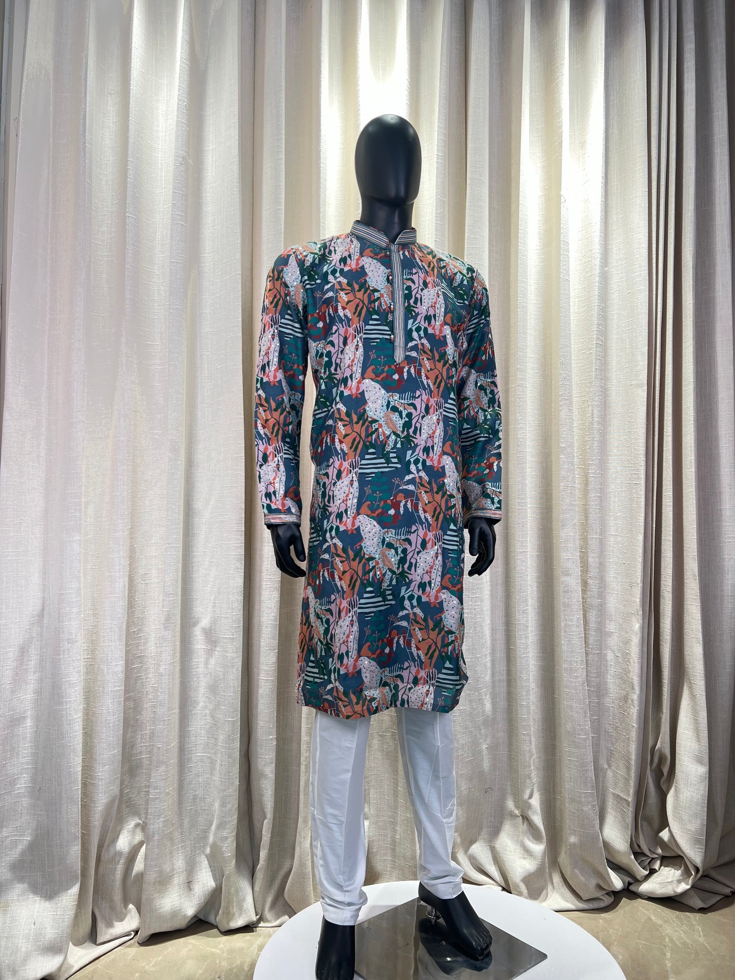 Teal Green Printed Kurta with Abstract Jungle Motifs and Contrast Detailing