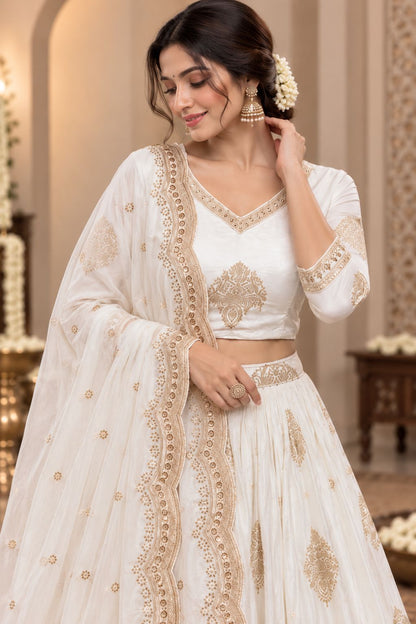 Ivory White Embroidered Lehenga Choli Set with Golden Zari Work, Traditional Motifs & Scalloped Dupatta | Wedding & Festive Wear