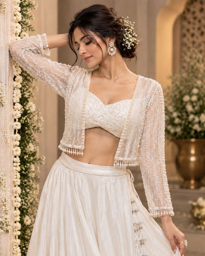 White Designer Lehenga Choli Set with Pearl Embellished Blouse, Sheer Lace Jacket & Flared Skirt | Elegant Festive Wear