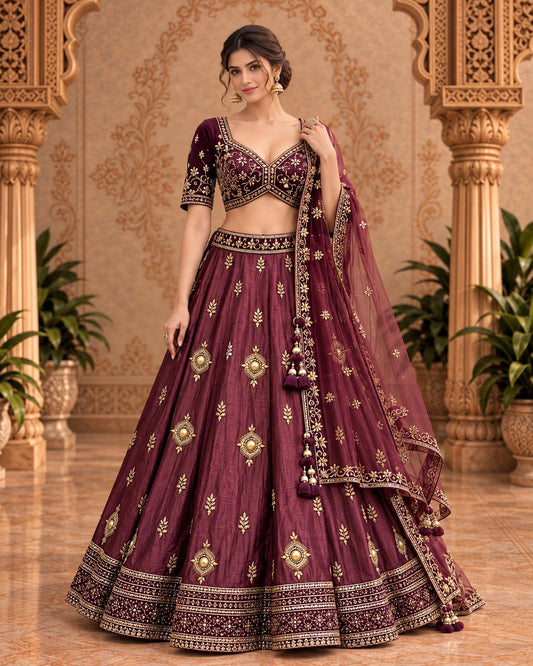 Wine Maroon Embroidered Lehenga Choli with Antique Gold Motifs and Sheer Dupatta