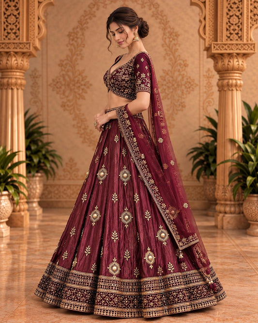 Wine Maroon Embroidered Lehenga Choli with Antique Gold Motifs and Sheer Dupatta