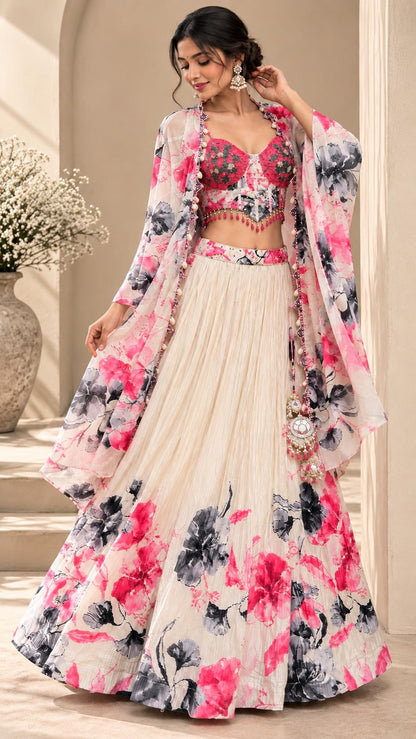 Ivory Floral Printed Lehenga Choli Set with Pink & Black Flowers, Embellished Crop Top, Shrug & Tassel Details | Festive Wear