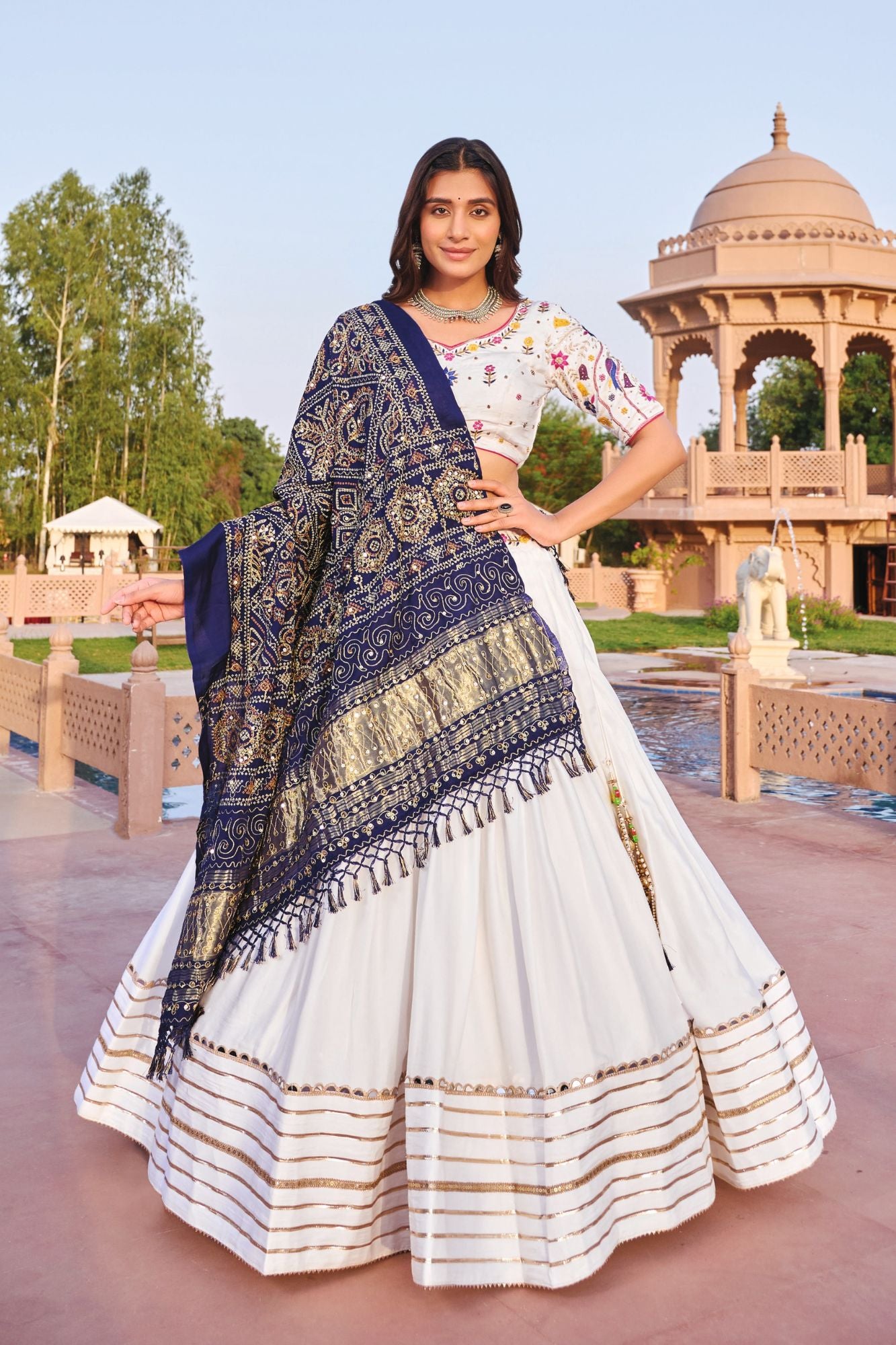 White Festive Chaniya Choli with Navy Blue Patola Dupatta and Floral Embroidered Blouse