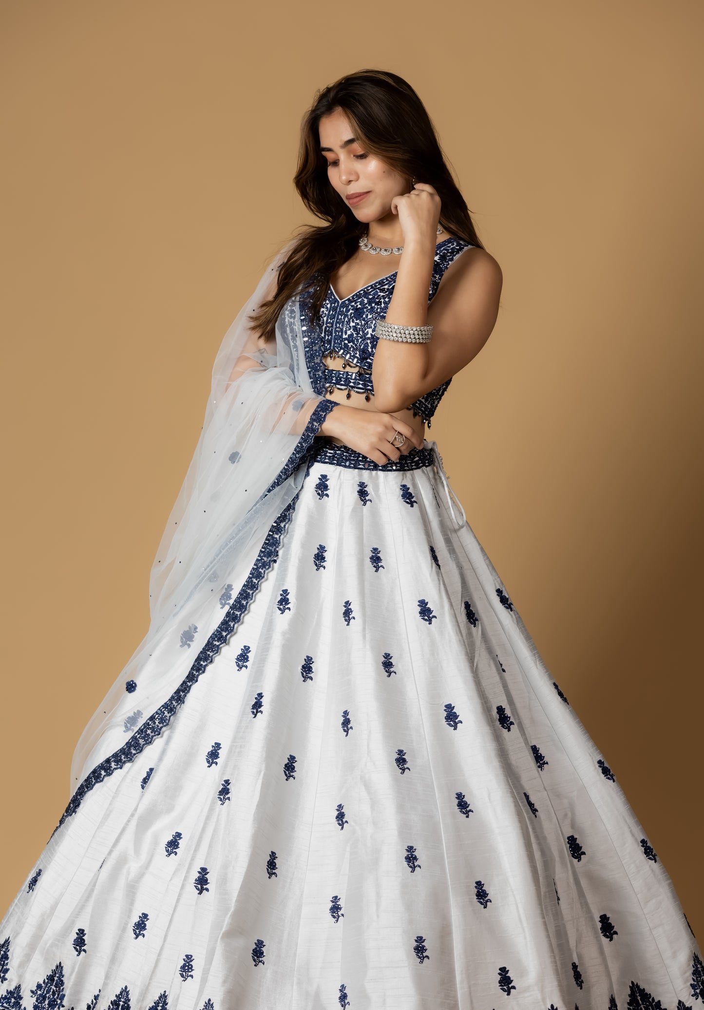 White and Navy Blue Embroidered Lehenga Choli with Mirror Work Detailing