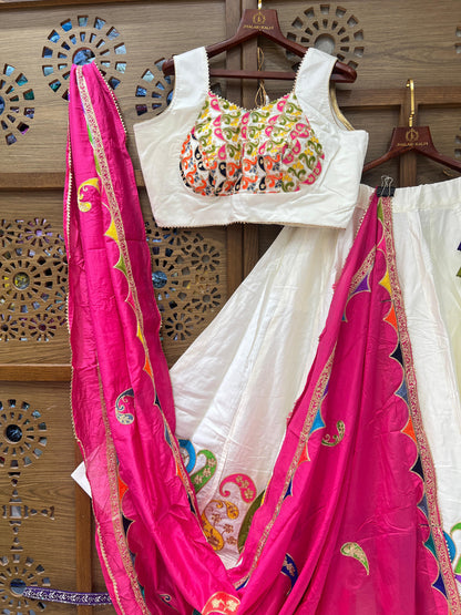 White and Rani Pink Navratri Chaniya Choli with Multicolor Embroidery and Paisley Work