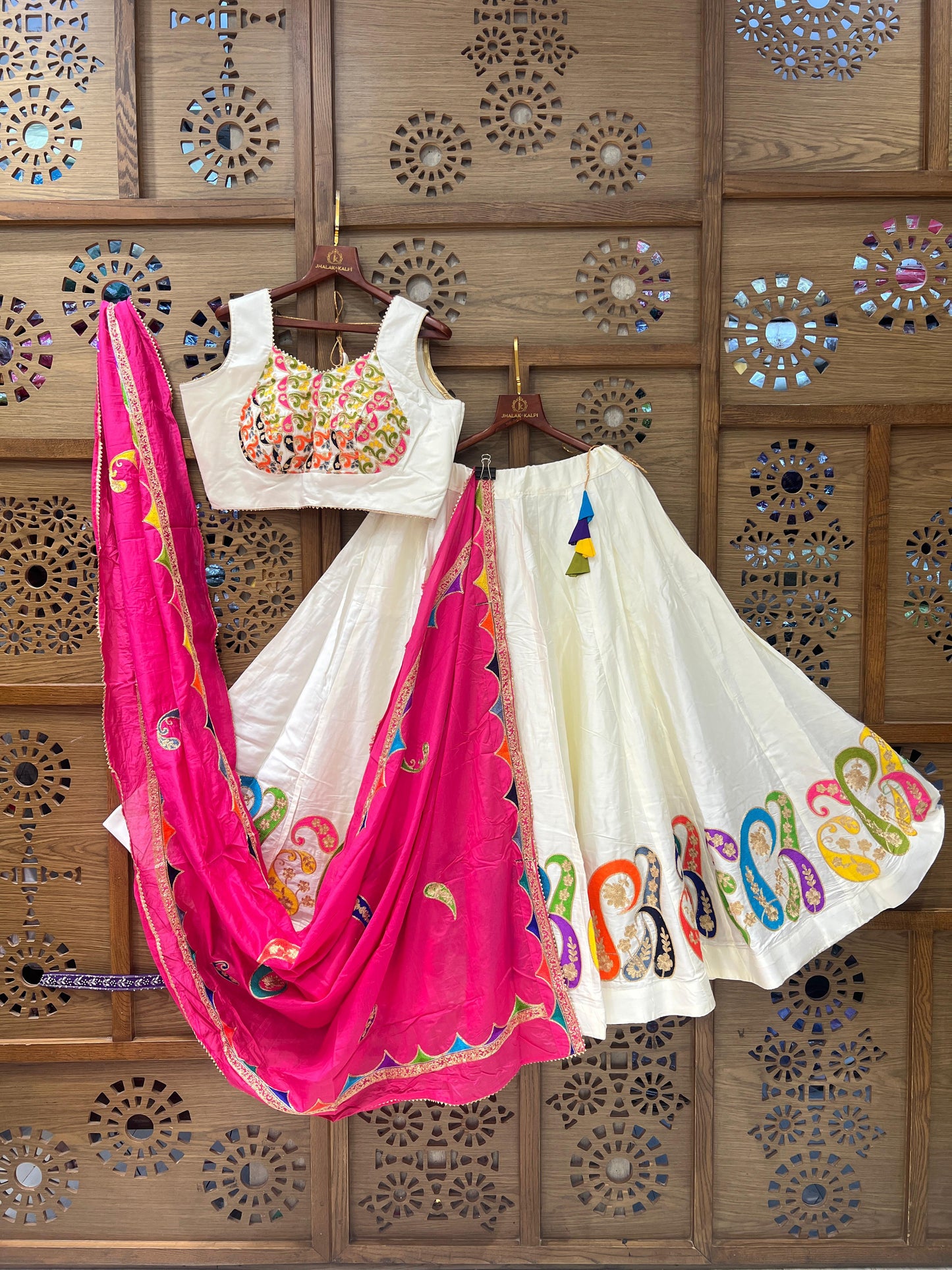 White and Rani Pink Navratri Chaniya Choli with Multicolor Embroidery and Paisley Work